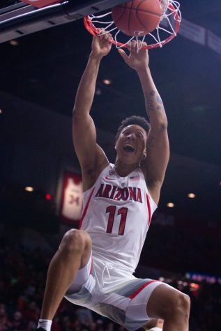 Forward Ira Lee dunks the ball during the game against Cal on Thursday, Feb. 21 at McKale Center. Arizona beat Cal 76-51.
