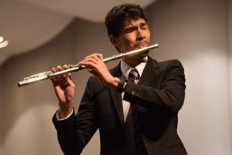 Ivo Shin plays the flute during the 46th annual President’s Concert at the University of Arizona. Shin was one of four contest winners given the opportunity to play in the concert.