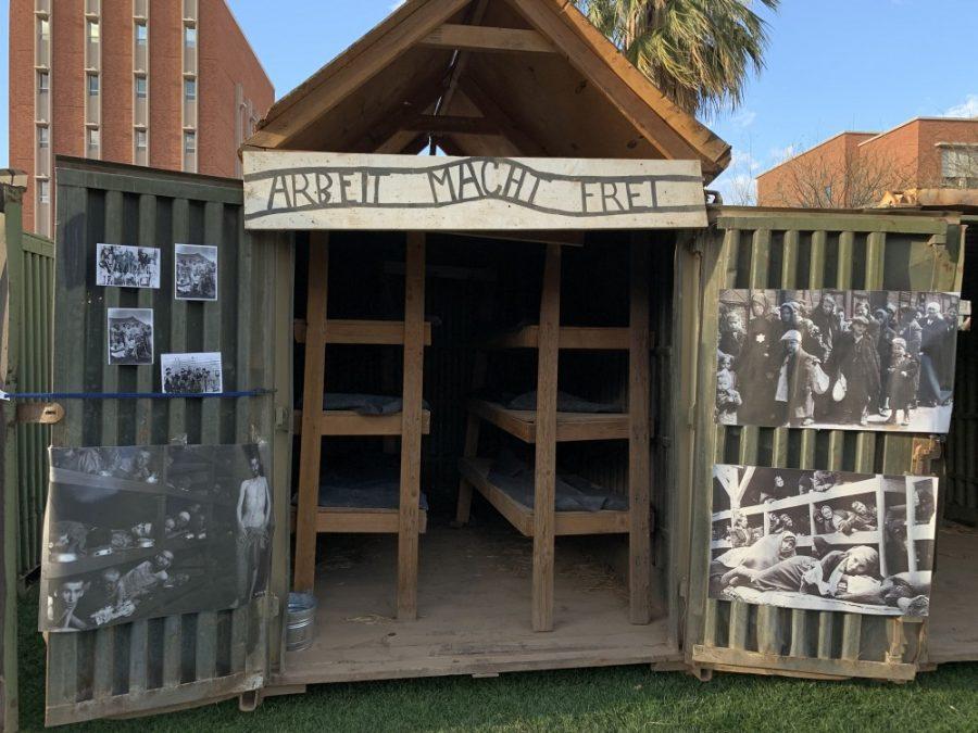 For the 28th Annual Holocaust Vigil, the UA Theater Department worked with Hillel to have these Thecattle car replicas where people were held and transported in made. They have photos on them of people in the camps and each pod tells a different part of the story of Jewish life both before and during the holocaust