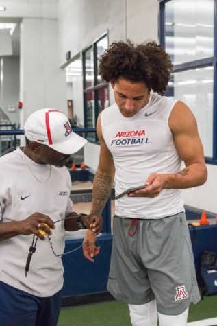 Shawn Poindexter and University of Arizona Track and Cross Country Director, Fred Harvey, go over some essentials while training for the NFL's Pro Day. 