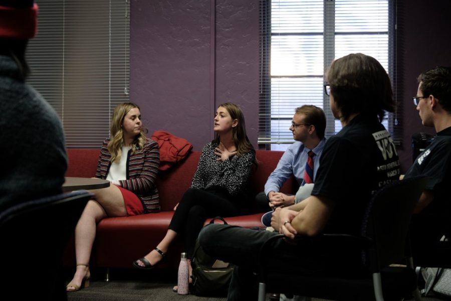 (Left to right) Sydney Hess, Kate Rosenstengel, and Bennett Adamson listen to student questions during their candidate forum on Mar. 13 in Tucson, Ariz. The trio are running for president, administrative vice president, and executive vice president respectively.