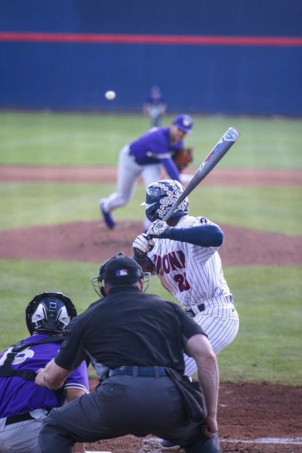 Outfielder, Donta Williams (23) on the plate heat on Saturday, April 6, 2019, in Tucson, Ariz. The Wildcats defeated the Huskies, 14-2.