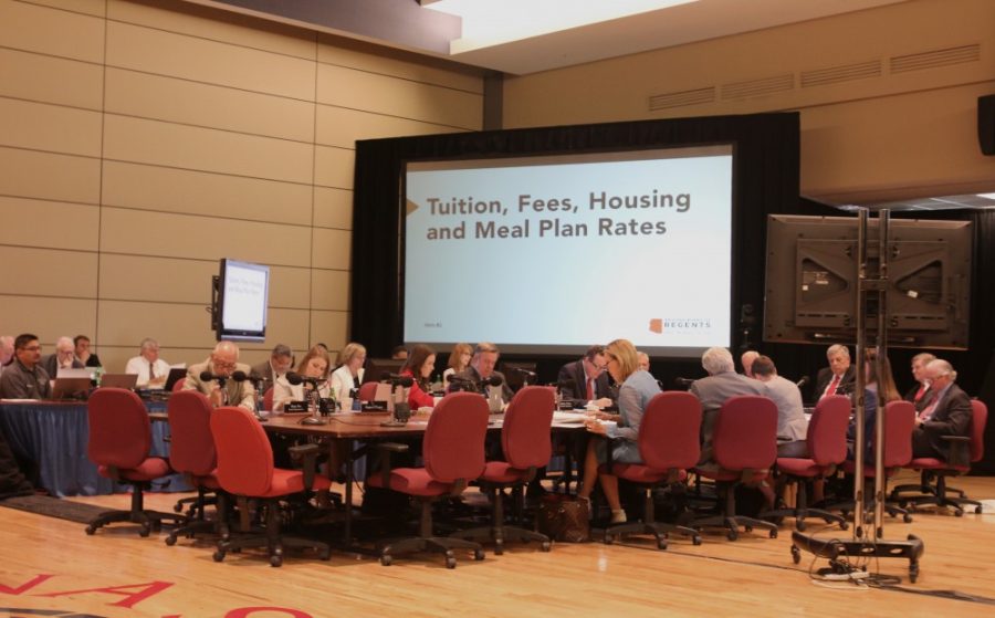 Regents approve tuition increases, face student protesters on campus