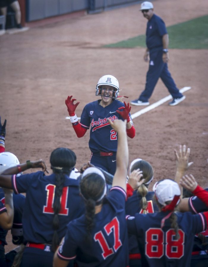 Hannah+Martinez+%282%29+of+the+Arizona+softball+team+running+to+home+plate+to+celebrate+after+she+hit+a+homerun+at+Rita+Hillenbrand+Memorial+Stadium+on+Saturday%2C+March+30%2C+2019%2C+in+Tucson.+This+was+her+first+career+home+run.