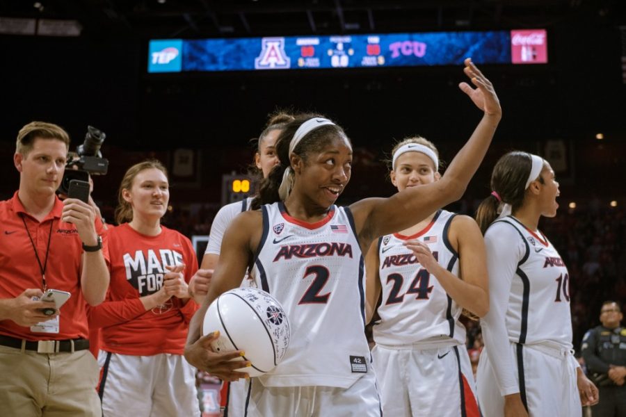 Aari+McDonald+%282%29+and+the+womens+basketball+team+watch+coach+Adia+Barnes+speak+after+their+over+TCU+on+Apr.+3+in+the+McKale+Center.