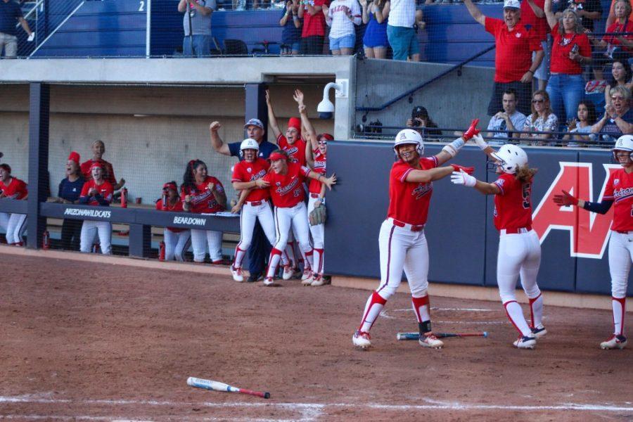 Arizona softball team celebrates after making the second run of the 4th inning. This made the cats take back the lead 4-1 and eventually beating Ole Miss 9-1 and advancing to the Womens College World Series in June, 2019.