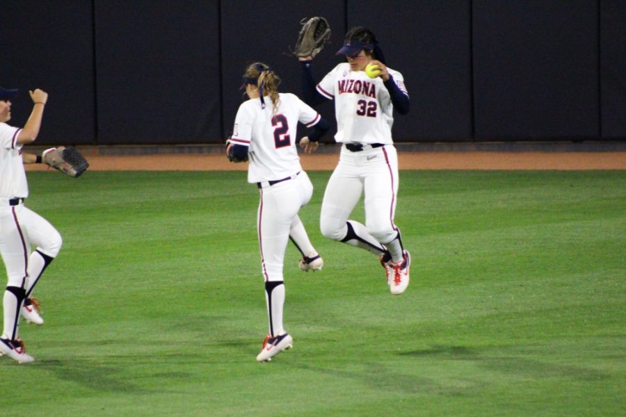 Arizona+softball+outfielders+Hannah+Martinez+%282%29+Alyssa+Palomino-Cardoza+%2832%29+and+Carli+Campbell+celebrate+after+defeating+Harvard+5-1+in+the+first+game+of+the+NCAA+Tournament+Tucson+Regional+at+Hillenbrand+Stadium+on+May+17.%26nbsp%3B