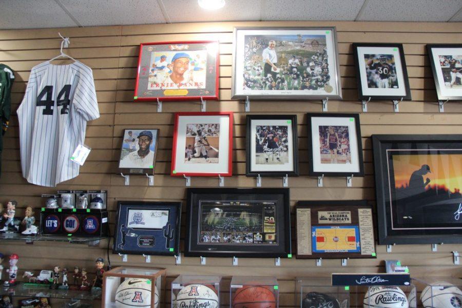 Overtime+Sports+has+a+collection+of+memorabilia+that+ranges+from+bobble+heads+to+jerseys+from+multiple+teams.+The+store+also+holds+baseballs+signed+by+various+players+with+their+rookie+card+underneath.+