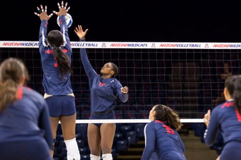 Arizona Wildcats middle blocker Shardonee Hayes (3) and Arizona Wildcats outside hitter Elizabeth Shelton (17) during the Arizona Wildcats Volleyball Red/Blue scrimmage Aug. 24, 2019 in Tucson, Ariz.