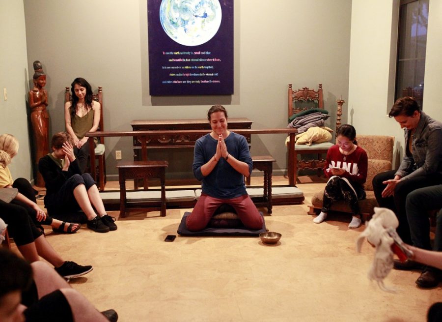 Jeff Schlueter (left), from the Center for Compassion Studies, leads a group in meditation at the University of Arizona  on Monday, Sept. 24, 2019. 
