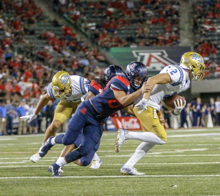 Bryson Cain  (54) making a tackle at Arizona Stadium on Saturday September 28, 2019 in Tucson Ariz. Arizona held on to beat UCLA 20-17. 