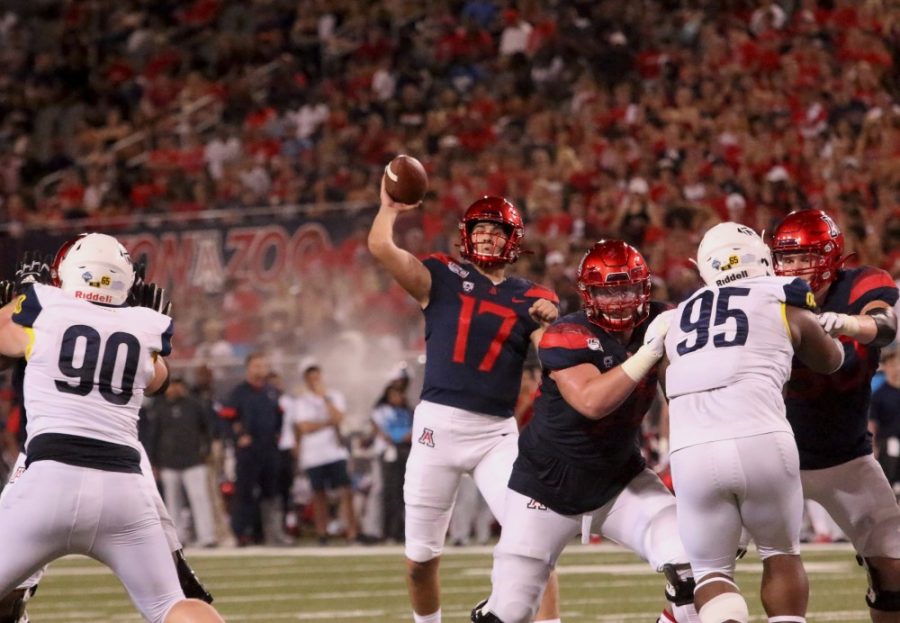 Arizona freshman Grant Gunnell (17) spirals the ball down to his wide receiver, fro another Arizona touchdown.  During the halftime of the Arizona-Northern Arizona University game the Wildcats lead 51-13.