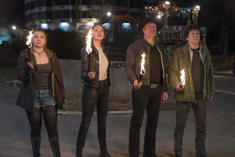 Abigail Breslin, Emma Stone, Woody Harrelson and Jesse Eisenberg in “Zombieland: Double Tap” (2019).