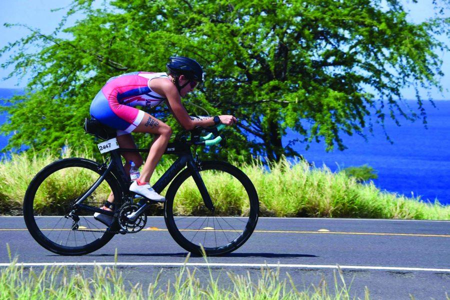 Tricats+athlete+Eryn+Schmisseur+during+her+bike+ride+as+a+part+of+the+Kona+IRONMAN+World+Championships.+She+qualified+for+the+World+Championships+after+getting+first+place+in+her+age+group+at+Ironman+Arizona+in+2018.