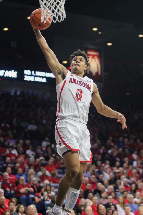 Freshman Josh Green (0) jump sup to dunk the ball during the second quarter of the Arizona-San Jose State game at the McKale Center on Thursday November 14, 2019. The Wildcats defeated the Spartans 87-39. 