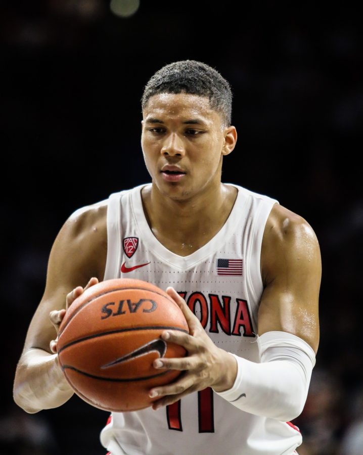 Arizona junior Ira Lee (11) focuses on the ball before taking a free-throw in the second period of the Arizona- Illinois game on Sunday November 10. 