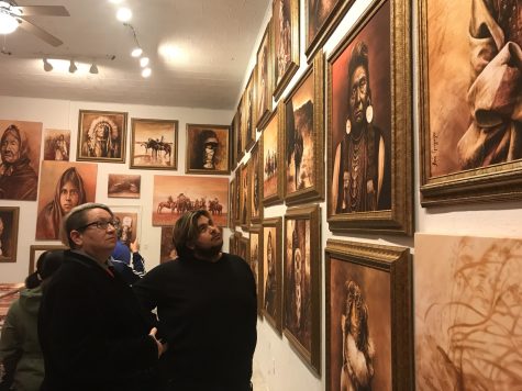 Attendees of the Edward Curtis Legends reception at Studio ONE: A Space for Art and Activism. The show lasts until March 1 and is open to the public for free.