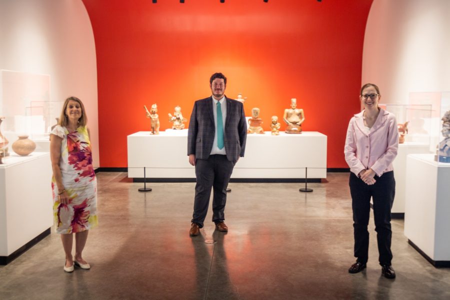 Members of TMAs curatorial team in the Kasser Family Wing of Latin American Art. L to R: Dr. Julie Sasse, chief curator; Dr. Kristopher Driggers, assistant curator, Schmidt Curator of Latin American Art; and Christine Brindza, senior curator, Glasser Curator of Art of the American West. (Photo by Ray Cleveland)