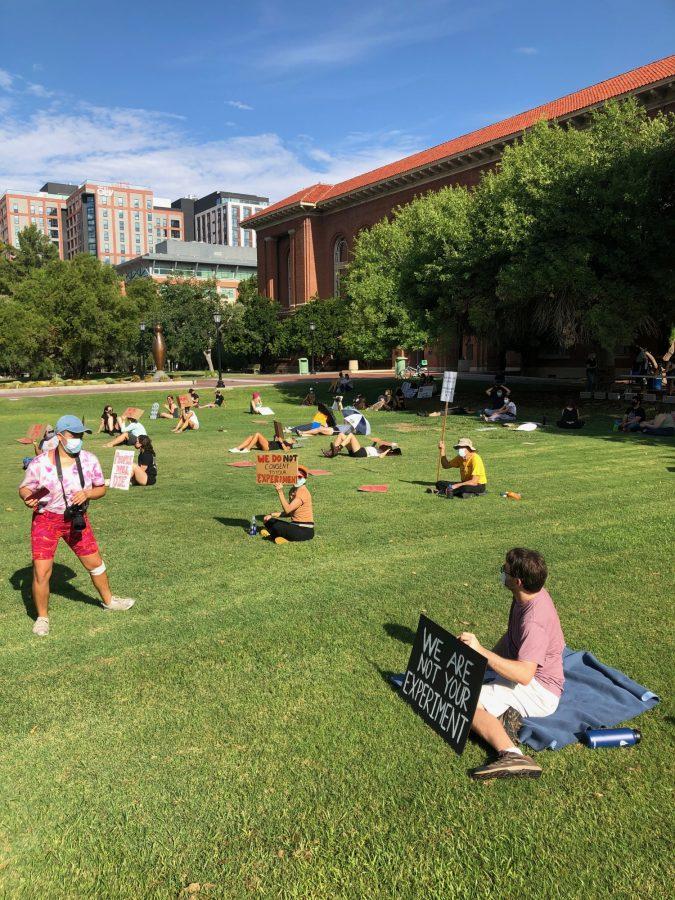 Graduate students apart of the Coalition of Academic Justice at the University of Arizona protested the reopening of campus Friday, Aug. 14.  
