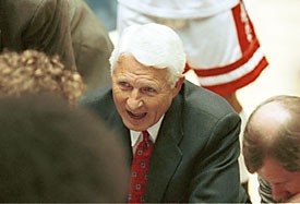 Lute Olson gives his team instructions during a timeout of a game in McKale Center.