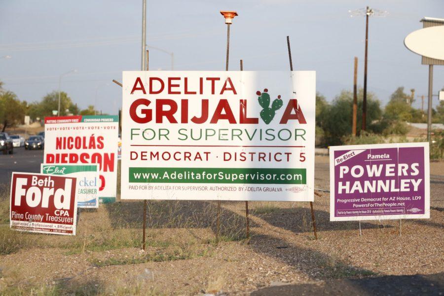 Campaign signs placed on the side of Grant Road heading east in Tucson, Ariz., Monday, Sept. 21.