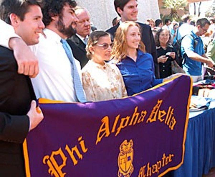 A+2006+photo+of+Brian+Bloodworth%2C+left%2C+who+was+the+pre-law+president+of+Phi+Alpha+Delta+fraternity+at+the+time%2C+and+Phi+Alpha+Delta+members+Jeremy+Zarzycki%2C+Heather+Lane+and+Ryan+Williams+posing+with+Supreme+Court+Justice+Ruth+Bader+Ginsburg+at+the+James+E.+Rogers+College+of+Law.+Bader+Ginsburg+passed+away+Friday%2C+Sept.+18.