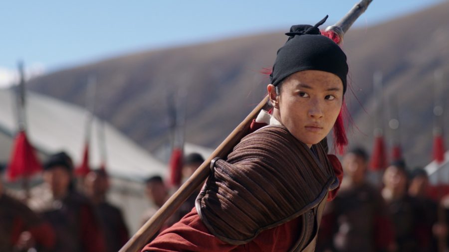 Still frame from the live action Disney movie Mulan (2020), based off the animated 1998 classic of the same name. The live action movie stars actress Yifei Liu (pictured). Image courtesy Disney Enterprises, Inc.