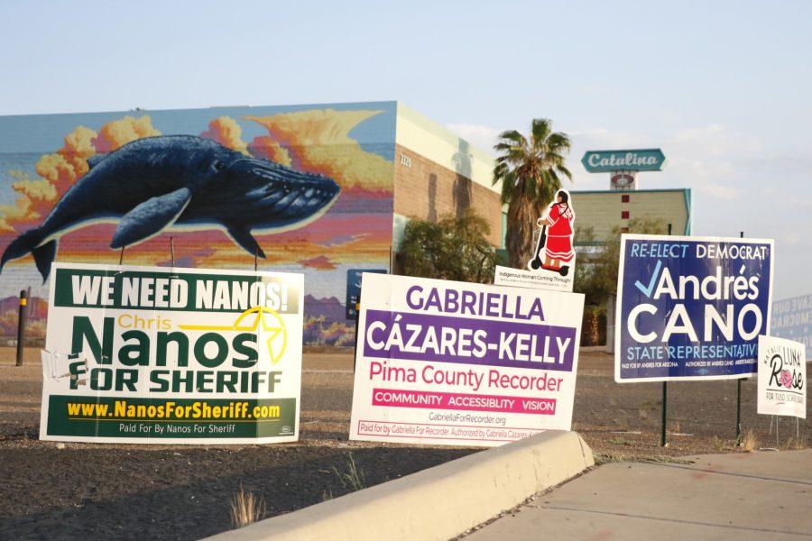 Campaign signs placed at the southeast corner of the Grant and Campbell intersection in Tucson, Ariz., Monday, Sept. 21.