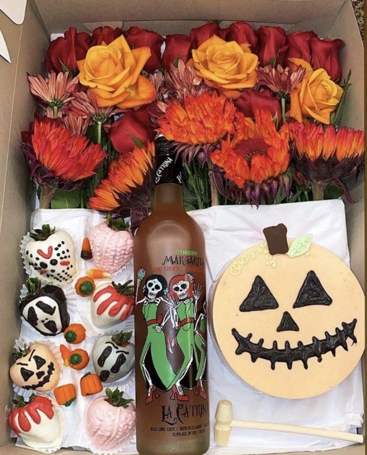 Customized+wine+box+from+Tannas+Botannas%2C+including+custom+berries%2C+a+breakable+chocolate+circle+pumpkin+and+four+different+types+of+flowers.+Courtesy+Tanna+Cole.+Original+photo+on+Tanna+Coles+Instagram.
