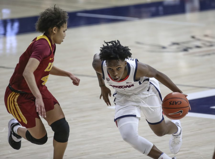 Shaina Pellington drives to the basket after a crossover to shake a USC defender on Sunday, Dec. 6, 2020, in Tucson, Ariz., in McKale Center. (Courtesy of Mike Christy/Arizona Athletics)