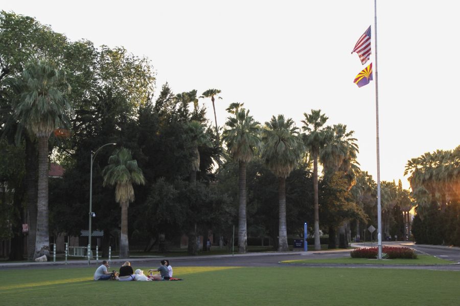 UA administration announced that it will move to Phase 2 of reentry on Feb. 22. Students at the University of Arizona enjoy a social distanced picnic beside Old Main on Monday, Sept. 28, 2020. 