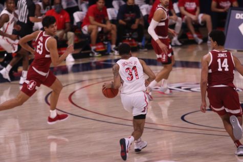 Arizona Wildcat Terrell Brown Jr., 31, moves his way across the court on Thursday, Jan. 28 at McKale Center v Stanford.