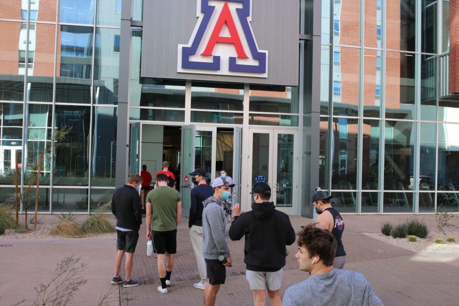 Students wait in line to enter the University of Arizona North Rec Center on Wednesday, Jan. 27. 