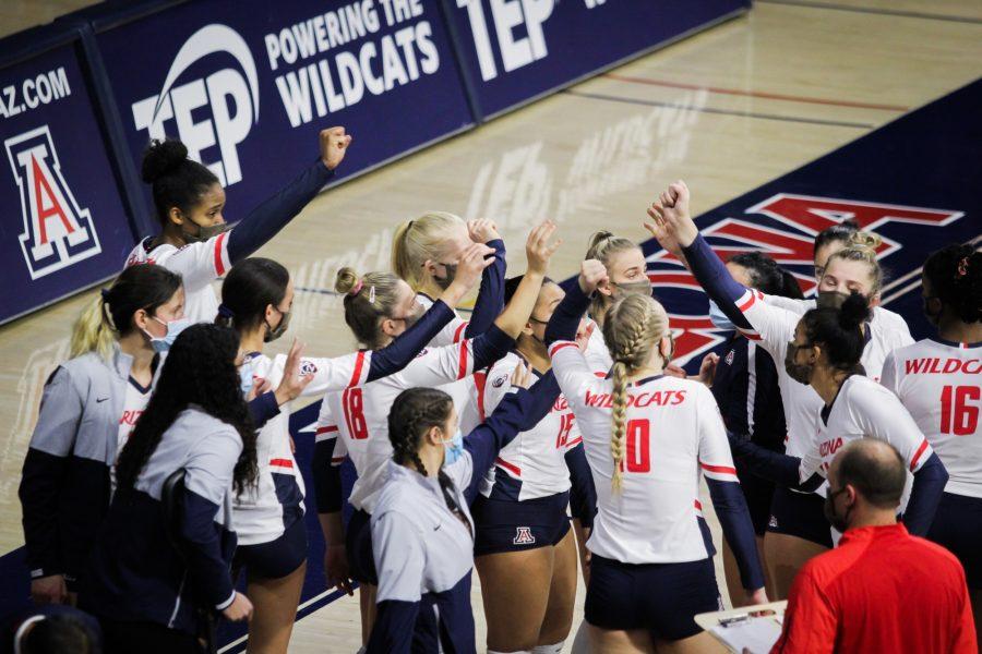 The Women’s Volleyball team comes together during a timeout before continuing with their match, in which they swept Stanford on Friday, Feb. 5. This is the first time since 2005 that the Wildcats have defeated the Cardinals while playing at home.