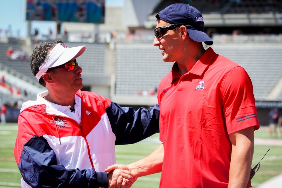 Jedd Fisch congratulates Rob Gronkowski on his win. Gronkowski’s team defeated Bruschi’s team 17-13 at the Spring Game on Saturday, April 24 in Tucson, Ariz.