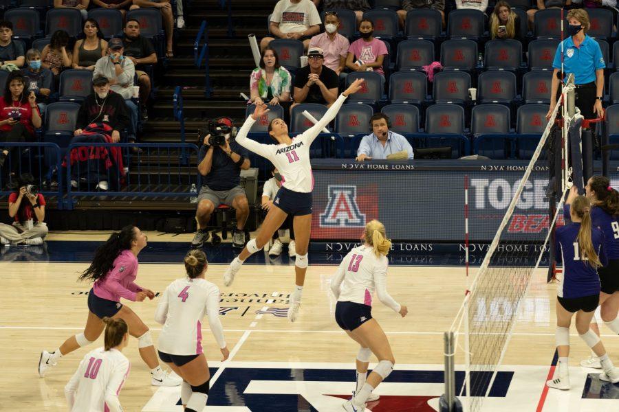 UAs+Jaelyn+Hodges+%2811%29+jumps+to+spike+the+ball+in+the+Wildcats+game+against+Washington+at+McKale+on+Oct.+8.+Washington+State+took+home+a+win+with+a+score+of+three+sets+to+one.%26nbsp%3B