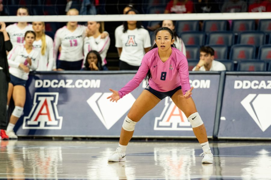 Kamaile Hiapo (8) prepares for an incoming serve against Washington at McKale Center on Oct. 8. Washington won the game with a final score of three sets to one. 