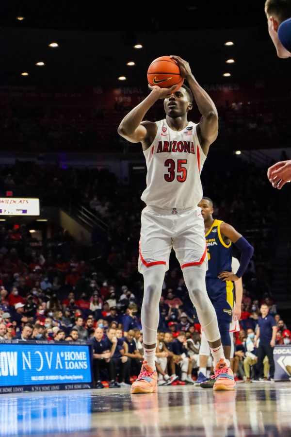 Christian+Koloko%2C+a+junior+on+the+Arizona+mens+basketball+team%2C+shoots+his+second+round+of+free+throws+on+Nov.+9+in+McKale+Center.+The+Wildcats+were+up+at+half+42-22.