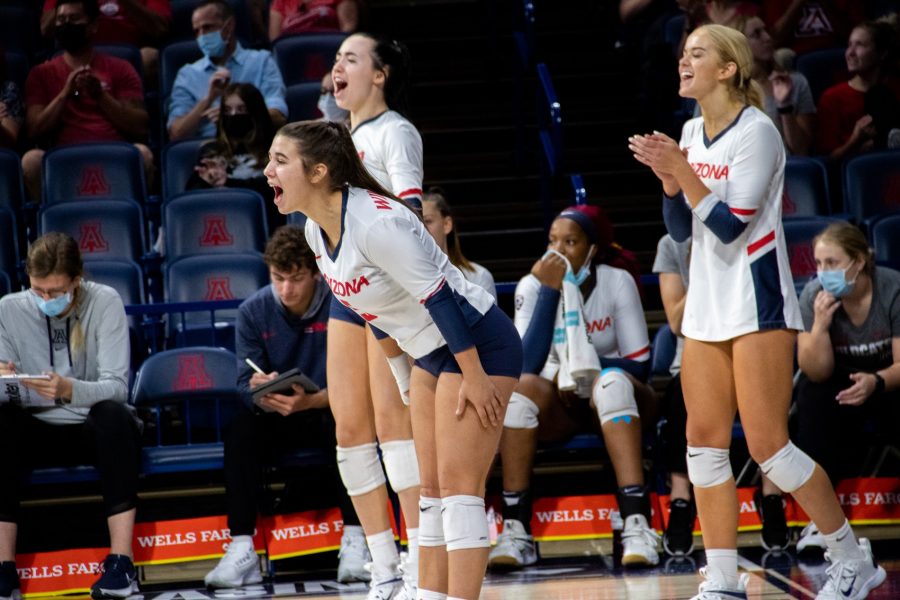 Jaleesa Caroccio (5) yells in excitement after the Arizona volleyball team scores a point at the game against Utah on Nov 12, located in McKale Center.