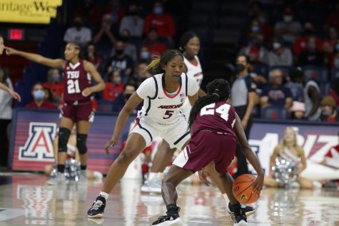 Koi Love (5) attempts to steal the ball during a game against Texas Southern University on Monday, Nov. 15 in McKale Center. The Arizona women's basketball team ended the game in a sweeping victory.