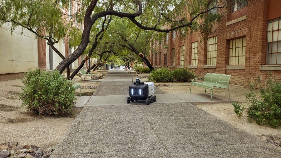A Yandex food delivery robot sitting between the Student Union Memorial Center and the College of Engineering building. Photo courtesy of Yulia Shveyko.