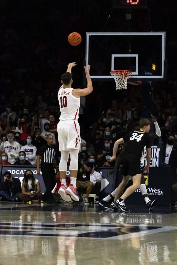  Arizona mens Basketball player Azuolas Tubelis attempts to score at McKale Center on Jan. 13. The wildcats went on to win the game against Colorado 76-55. 