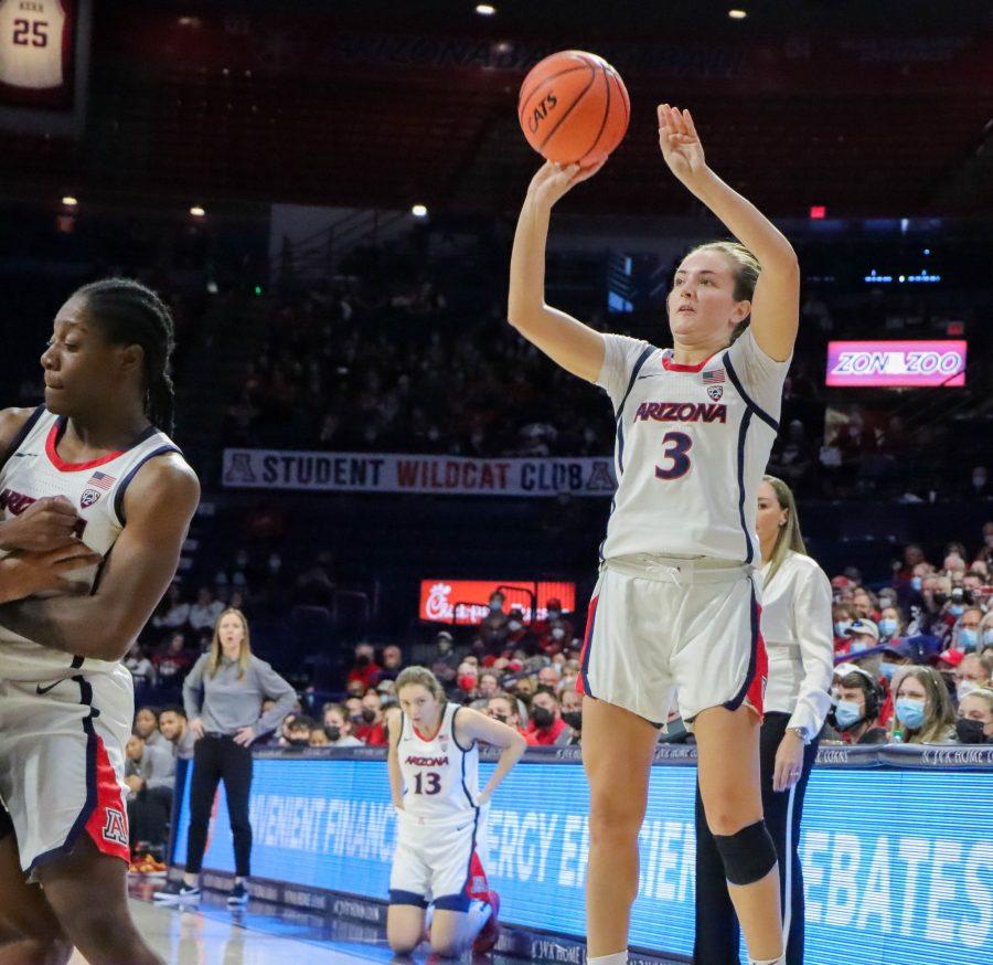 Taylor Chavez, a guard on the Arizona womens basketball team, takes a 3-point shot on Saturday, Feb. 26, in McKale Center. The Wildcats would go on to win the game 68-59.