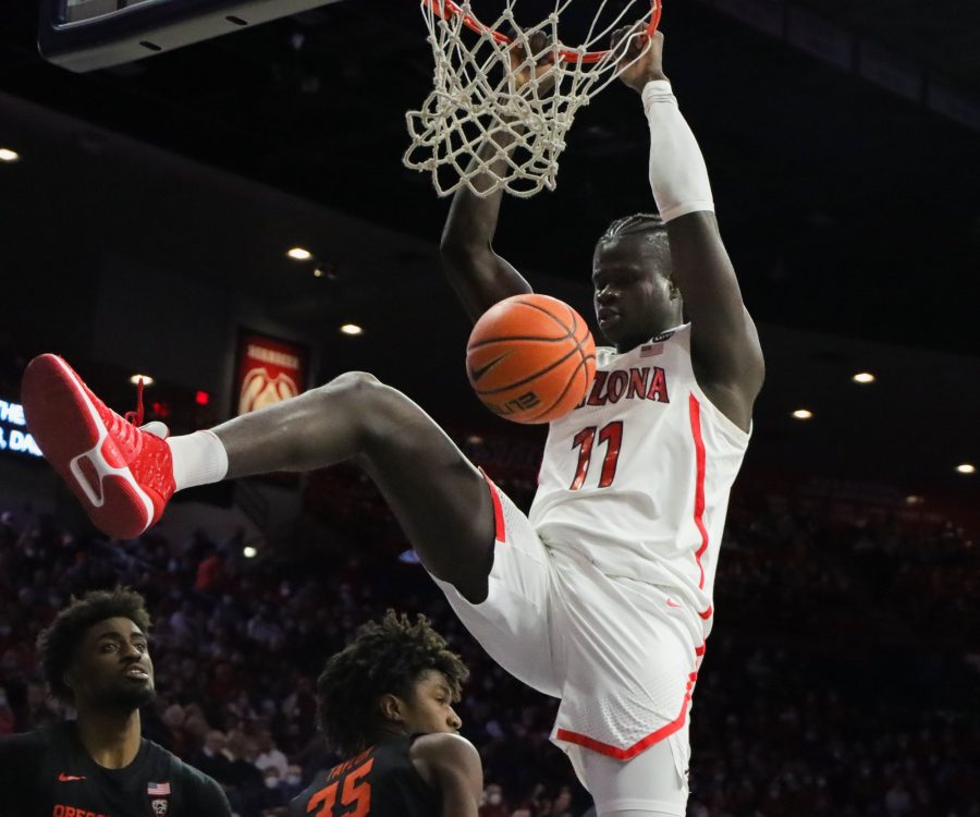 Oumar Ballo, center on the Arizona mens basketball team, dunks on Thursday, Feb. 17, in McKale Center. The Wildcats would win the game 83-69 against Oregon State University.
