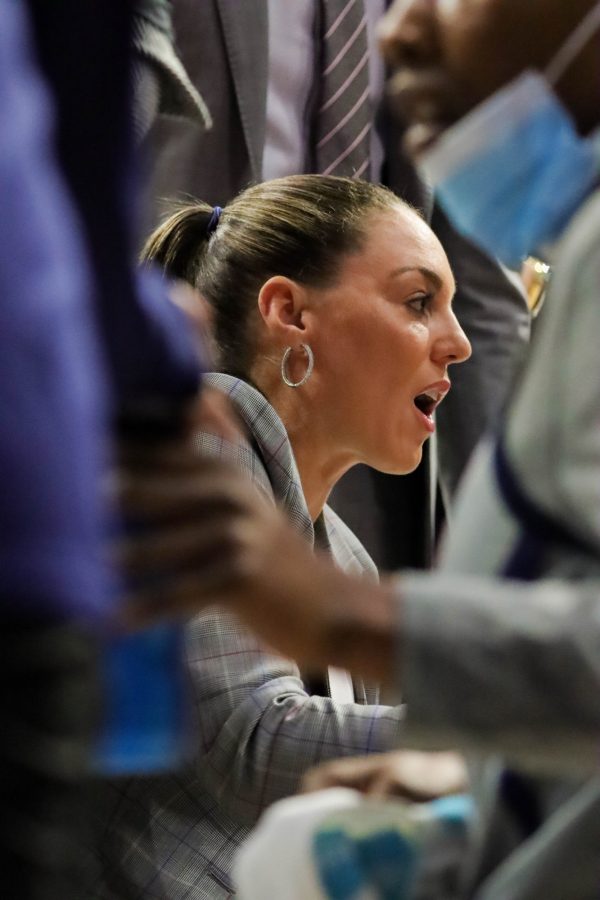 Head+coach+of+the+Arizona+womens+basketball+team%2C+Adia+Barnes%2C+talks+to+her+players+during+a+timeout+on+Sunday%2C+Feb.+6+in+McKale+Center.+The+Wildcats+would+lead+going+into+half+36-34.