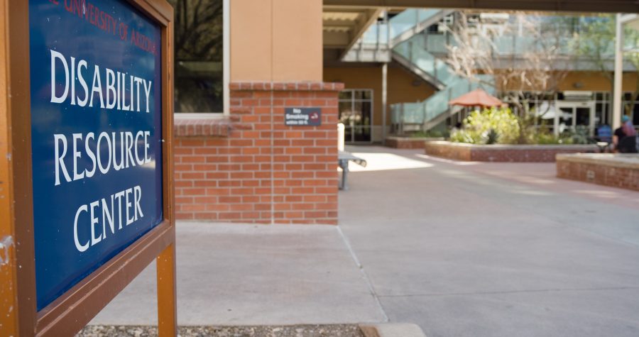 A sign for the Disability Resource Center stands in front of Highland Commons. The DRC is located within Highland Commons and houses offices and resources for students with disabilities. 
