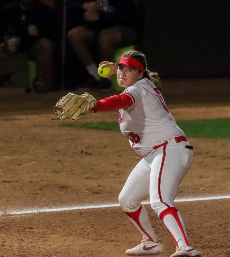 Izzy Pacho, one of the infielders on the Arizona softball team, throws the ball to third on Friday, March 4 at Rita Hilbrand Memorial Stadium. After a slow start, the Wildcats would win 11-3.