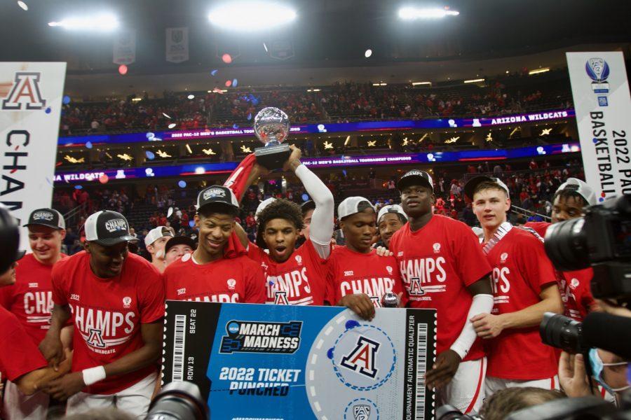 The+Arizona+Wildcats+mens+basketball+team+celebrates+after+winning+the+Pac-12+tournament+championship+on+March+12%2C+2022+in+Las+Vegas%2C+Nevada.+