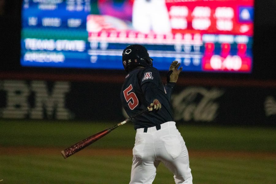 Chase Davis hits a baseball on March 4 at Hi Corbett Field. The Arizona baseball team won the game against Texas State University 7-2.