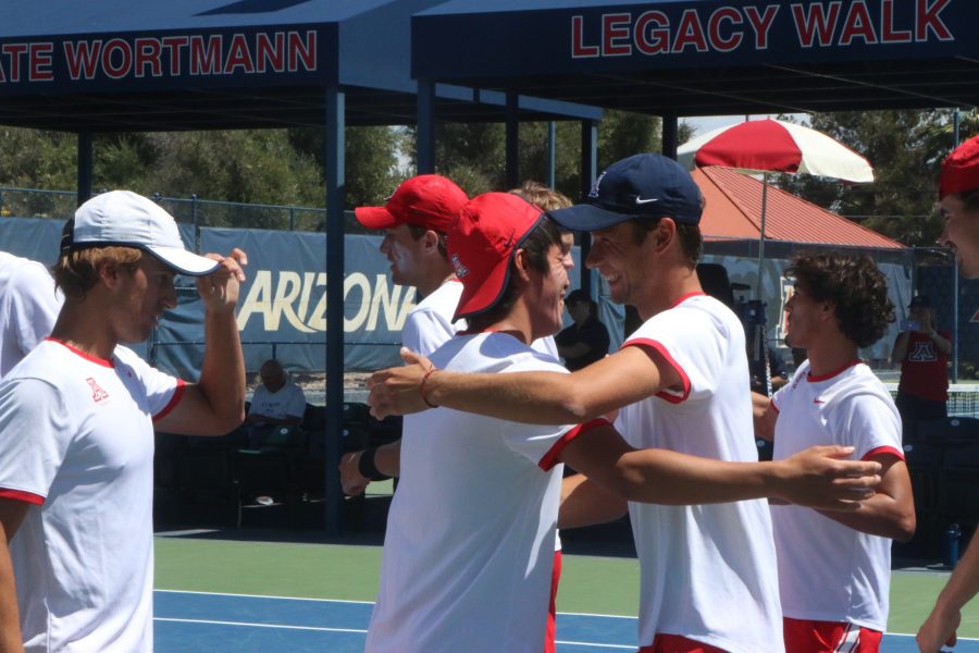 Players on the Arizona mens tennis team hype each other up before their match on April 3 at the Robson Tennis Center. The competition ended in Arizonas first victory over the University of California Berkley since 2004.